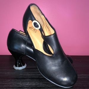 John Fluevog black with white soles Mary Janes.